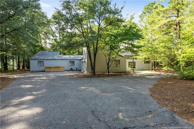 916 Rays Bridge Rd, Whispering Pines, NC 28327 - view of front of house with driveway