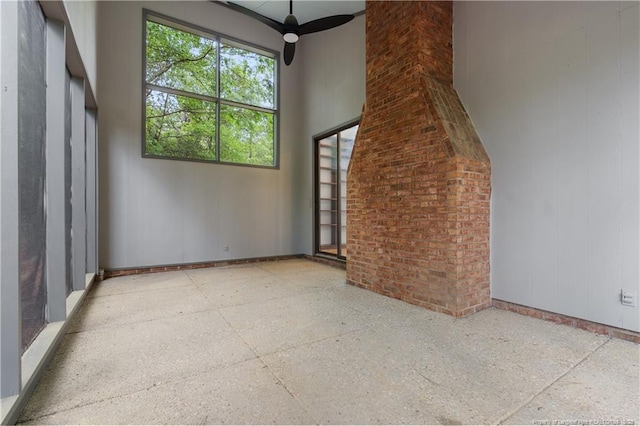 916 Rays Bridge Rd, Whispering Pines, NC 28327 - unfurnished living room featuring baseboards and ceiling fan
