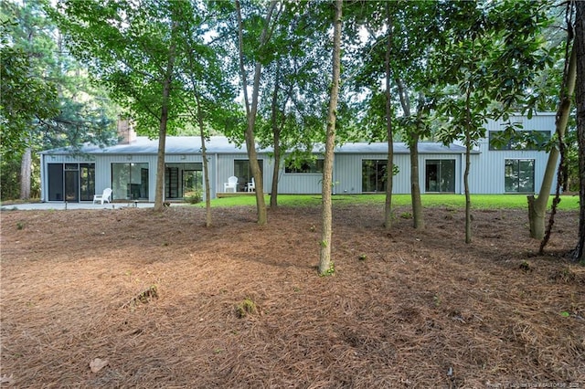 916 Rays Bridge Rd, Whispering Pines, NC 28327 - back of property with a chimney