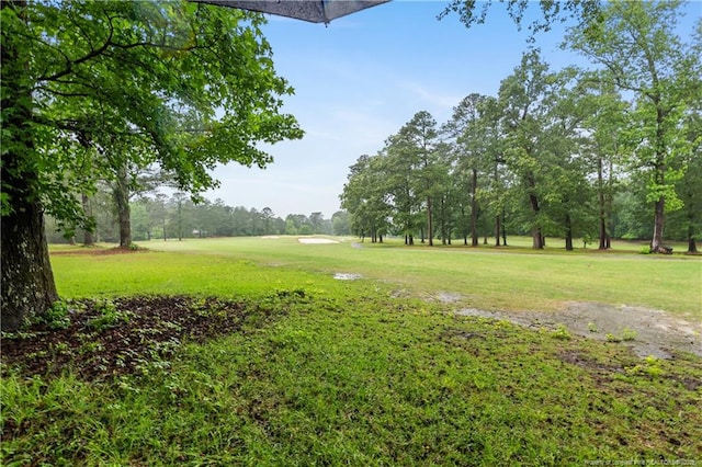 916 Rays Bridge Rd, Whispering Pines, NC 28327 - view of grassy yard featuring view of wooded area