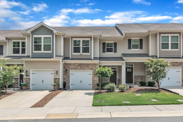 1126 Apogee Dr, Durham, NC 27713 - craftsman-style house featuring driveway, an attached garage, stone siding, and a front lawn