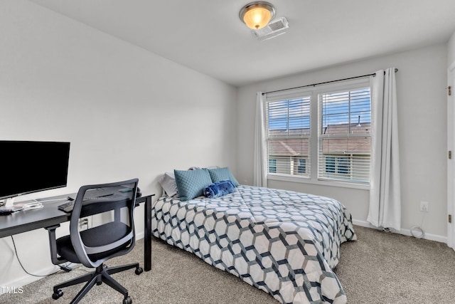 1126 Apogee Dr, Durham, NC 27713 - carpeted bedroom featuring baseboards and a desk