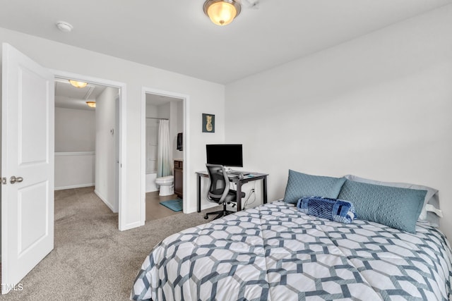 1126 Apogee Dr, Durham, NC 27713 - carpeted bedroom featuring baseboards and ensuite bath