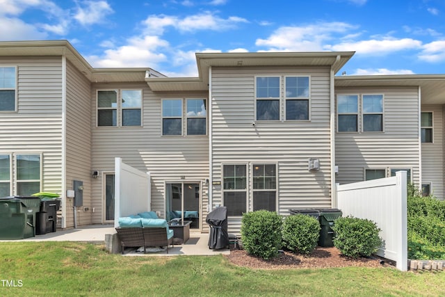 1126 Apogee Dr, Durham, NC 27713 - rear view of property featuring a patio and outdoor lounge area