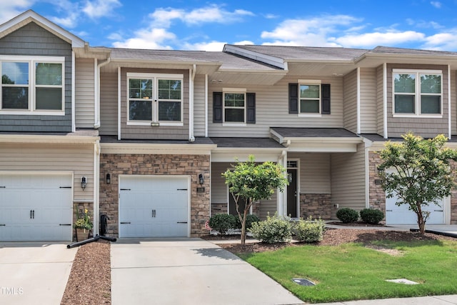 1126 Apogee Dr, Durham, NC 27713 - craftsman-style home featuring a garage, concrete driveway, and stone siding