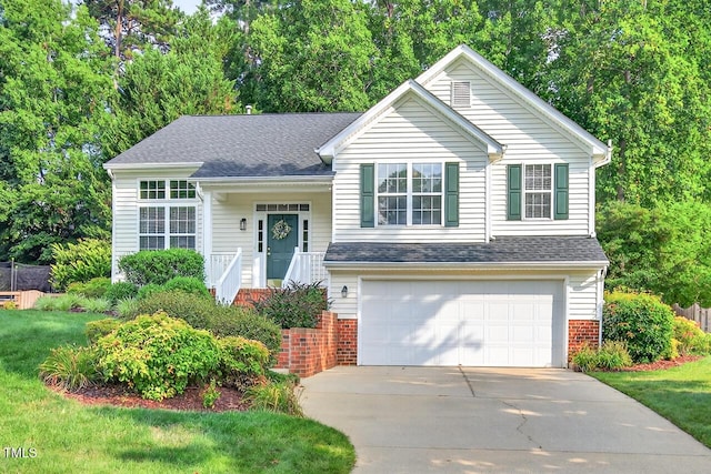 1004 Scotsburg Trl, Hillsborough, NC 27278 - split level home with brick siding, driveway, an attached garage, and a front lawn