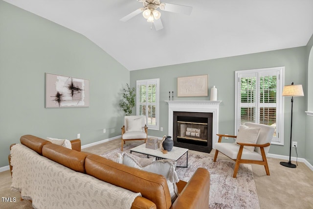 1004 Scotsburg Trl, Hillsborough, NC 27278 - living room featuring light colored carpet, plenty of natural light, lofted ceiling, a fireplace with flush hearth, and a ceiling fan