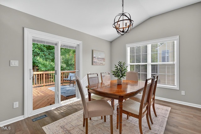 1004 Scotsburg Trl, Hillsborough, NC 27278 - dining space with a chandelier, lofted ceiling, and wood finished floors