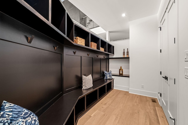 1616 Hunting Ridge Rd, Raleigh, NC 27615 - mudroom with light wood-style flooring and recessed lighting