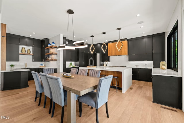 1616 Hunting Ridge Rd, Raleigh, NC 27615 - dining area featuring light wood-style flooring and recessed lighting