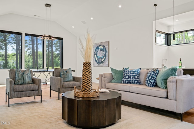 1616 Hunting Ridge Rd, Raleigh, NC 27615 - living area with recessed lighting, high vaulted ceiling, and light wood-style floors
