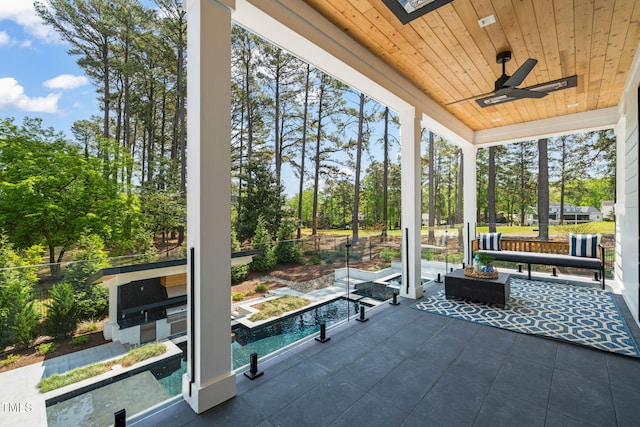 1616 Hunting Ridge Rd, Raleigh, NC 27615 - porch with a ceiling fan and an outdoor pool