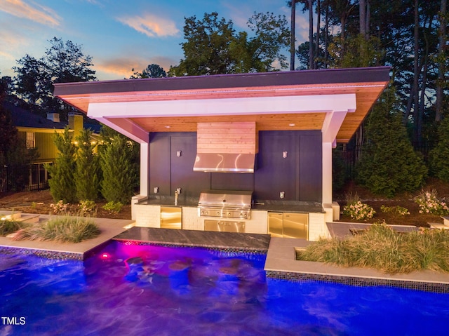 1616 Hunting Ridge Rd, Raleigh, NC 27615 - swimming pool with an outdoor kitchen and a patio area