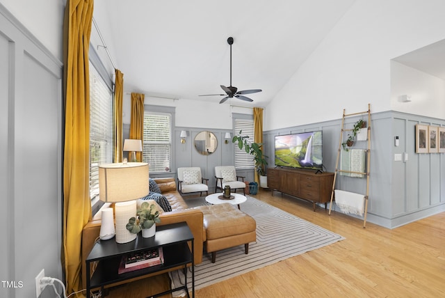 1010 S Person St, Raleigh, NC 27601 - living room featuring ceiling fan, wood finished floors, and high vaulted ceiling