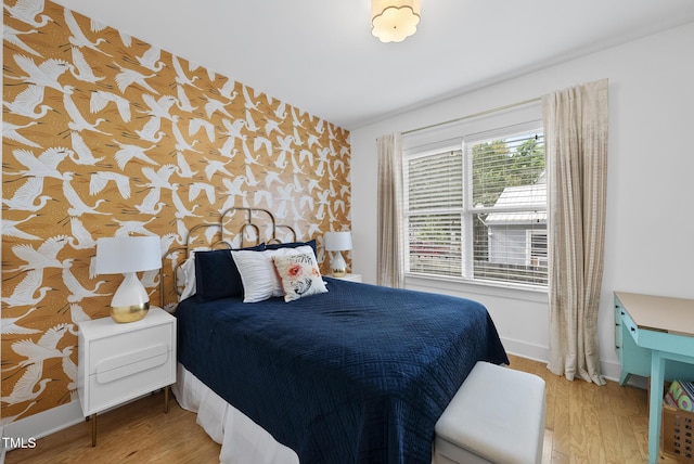 1010 S Person St, Raleigh, NC 27601 - bedroom with light wood-type flooring and baseboards