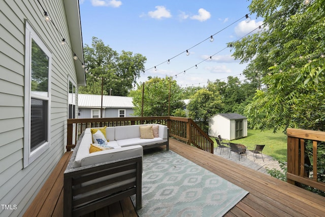 1010 S Person St, Raleigh, NC 27601 - wooden terrace featuring an outdoor living space with a fire pit and a storage unit