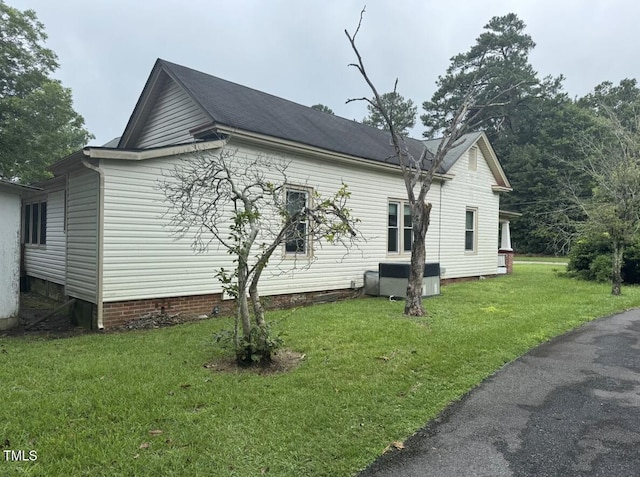 220 E Branch St, Spring Hope, NC 27882 - view of side of property with crawl space and a yard