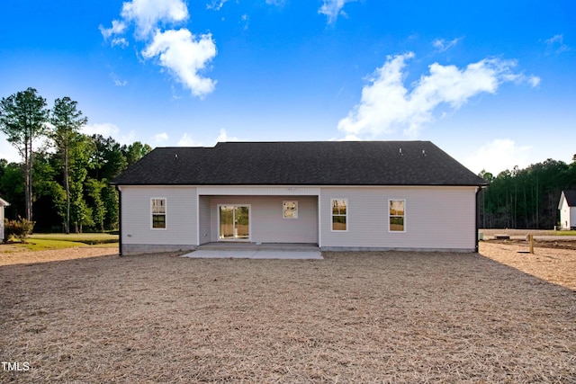 134 Cherrybirch Ln, Zebulon, NC 27597 - rear view of property with a patio