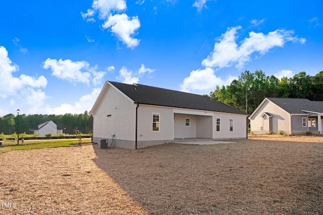 134 Cherrybirch Ln, Zebulon, NC 27597 - rear view of house with a patio