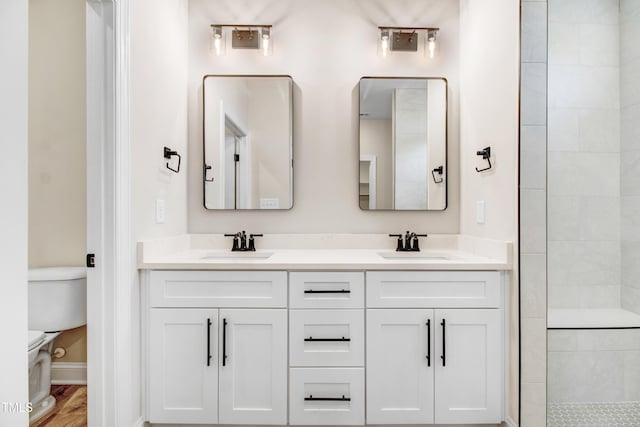 134 Cherrybirch Ln, Zebulon, NC 27597 - full bathroom featuring double vanity and tiled shower