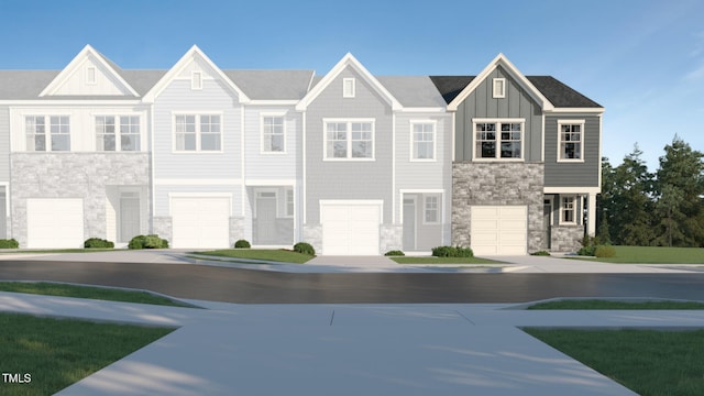 1151 Weavers Trace Dr, Zebulon, NC 27597 - view of front of home with stone siding, a garage, and board and batten siding