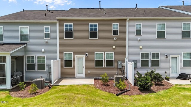 5721 Woodlawn Dr, Durham, NC 27703 - rear view of property featuring a patio area and a yard