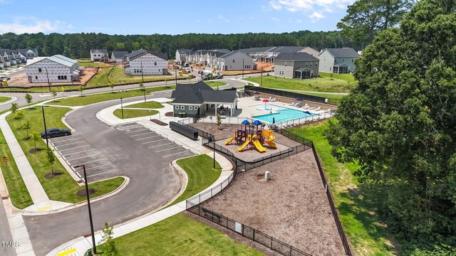 5721 Woodlawn Dr, Durham, NC 27703 - aerial view of residential area featuring a pool area and a forest