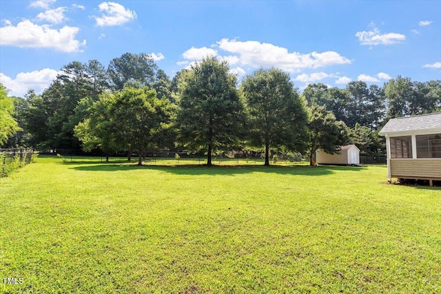 20 Allyson Ct, Youngsville, NC 27596 - view of yard with a storage unit and view of scattered trees