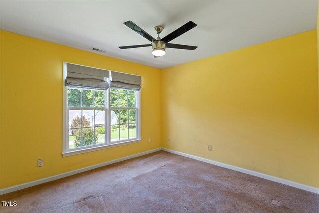 20 Allyson Ct, Youngsville, NC 27596 - empty room with a ceiling fan and carpet