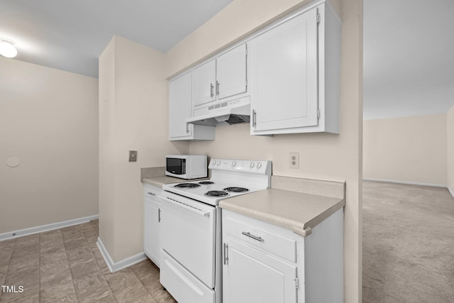 667 Pine Ridge Pl, Raleigh, NC 27609 - kitchen featuring white appliances, under cabinet range hood, and white cabinetry