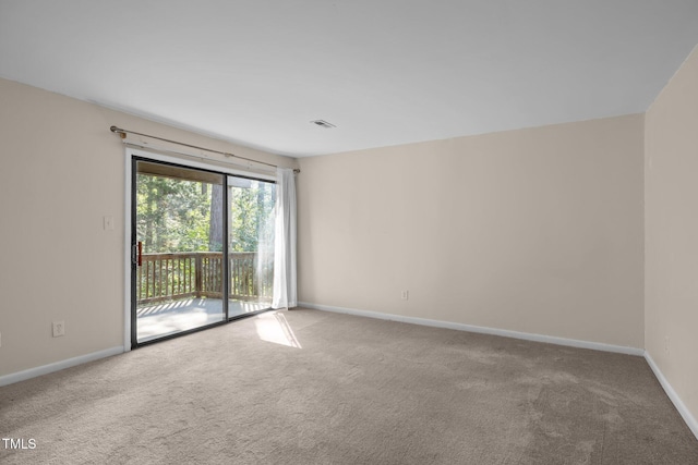 667 Pine Ridge Pl, Raleigh, NC 27609 - carpeted spare room featuring baseboards