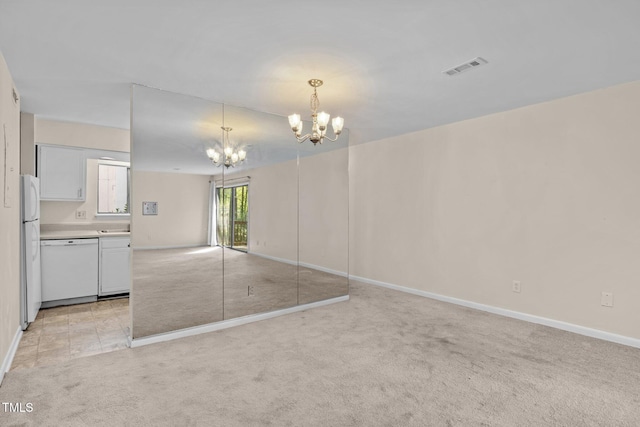 667 Pine Ridge Pl, Raleigh, NC 27609 - unfurnished living room with a chandelier and light carpet