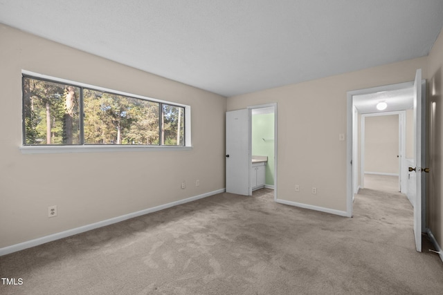 667 Pine Ridge Pl, Raleigh, NC 27609 - unfurnished bedroom with carpet flooring and ensuite bath