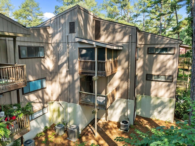667 Pine Ridge Pl, Raleigh, NC 27609 - view of side of home with a central AC unit
