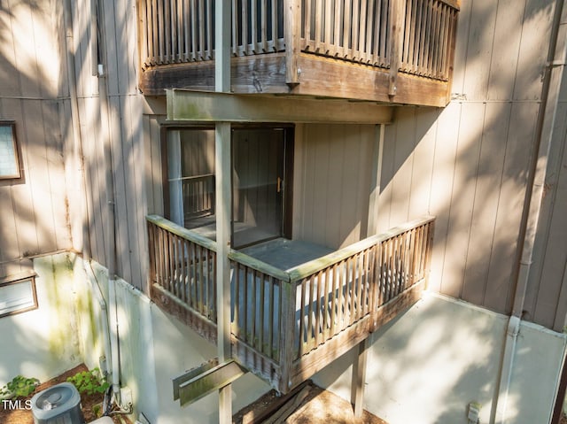 667 Pine Ridge Pl, Raleigh, NC 27609 - view of exterior entry with a balcony