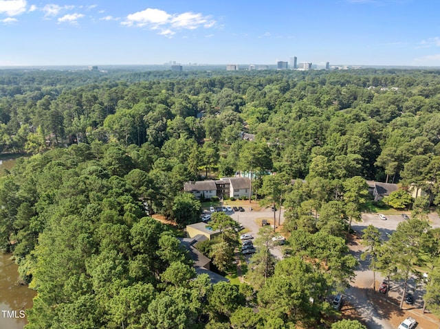 667 Pine Ridge Pl, Raleigh, NC 27609 - aerial view of property's location featuring a heavily wooded area
