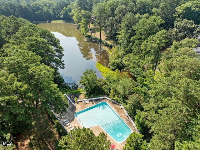 667 Pine Ridge Pl, Raleigh, NC 27609 - aerial overview of property's location with a large body of water and a forest