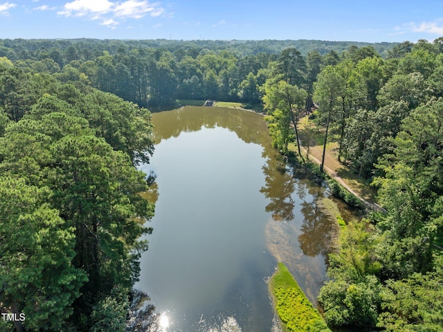 667 Pine Ridge Pl, Raleigh, NC 27609 - drone / aerial view of a heavily wooded area and a large body of water