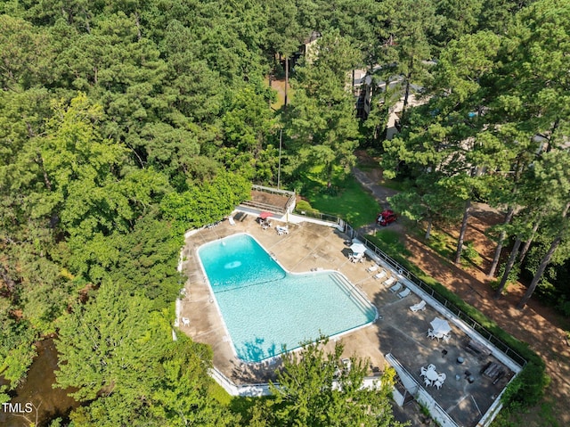 667 Pine Ridge Pl, Raleigh, NC 27609 - aerial view of a forest and a pool