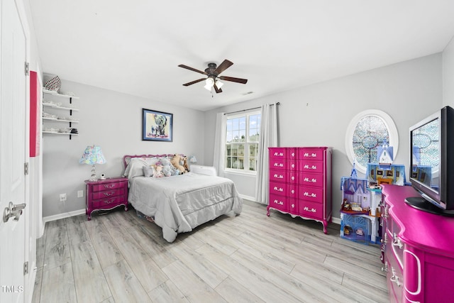7645 Winners Edge St, Raleigh, NC 27617 - bedroom with wood finished floors and a ceiling fan