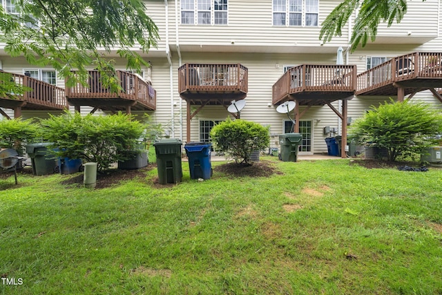 7645 Winners Edge St, Raleigh, NC 27617 - rear view of house featuring a yard