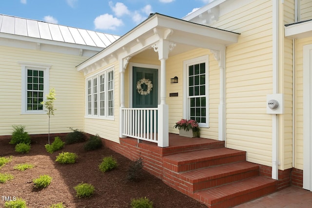 103 N Mckay Ave, Dunn, NC 28334 - property entrance with a standing seam roof and a metal roof