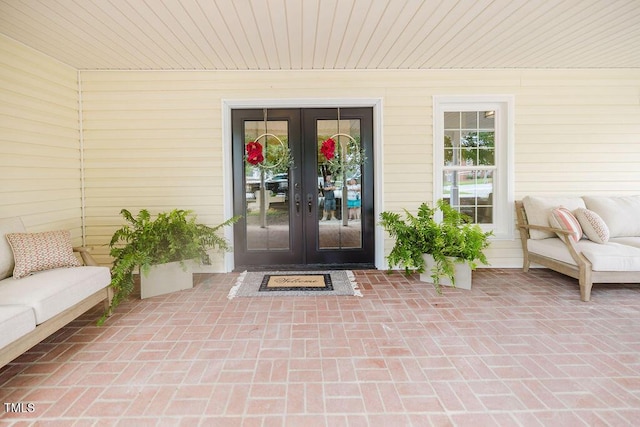 103 N Mckay Ave, Dunn, NC 28334 - property entrance featuring french doors and a patio area