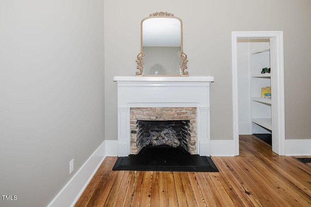 103 N Mckay Ave, Dunn, NC 28334 - detailed view of wood finished floors and a fireplace