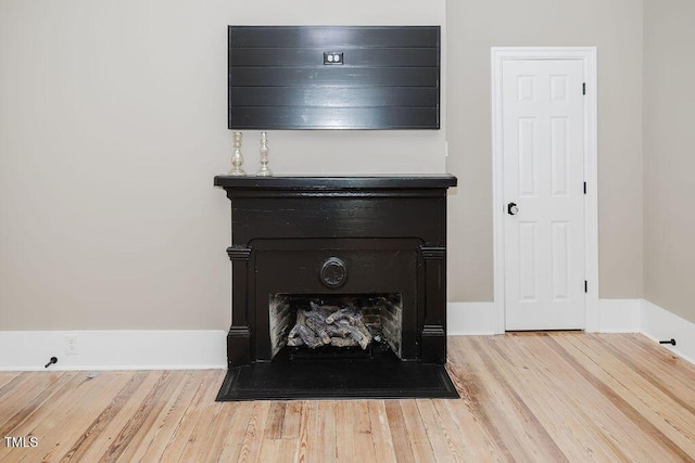 103 N Mckay Ave, Dunn, NC 28334 - detailed view of a fireplace and wood finished floors