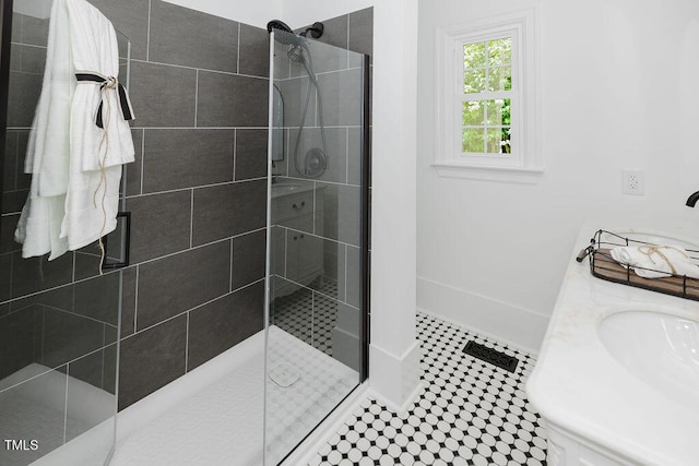 103 N Mckay Ave, Dunn, NC 28334 - bathroom featuring a walk in shower and double vanity