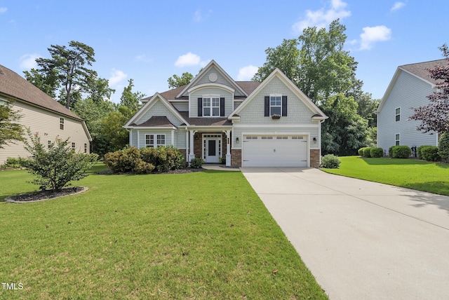 347 Country Mill Way, Fuquay Varina, NC 27526 - craftsman inspired home with concrete driveway, a front yard, a garage, and stone siding