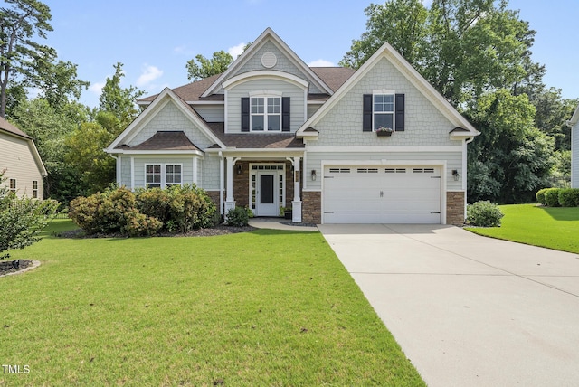 347 Country Mill Way, Fuquay Varina, NC 27526 - craftsman-style house with concrete driveway, a front lawn, a garage, a shingled roof, and stone siding