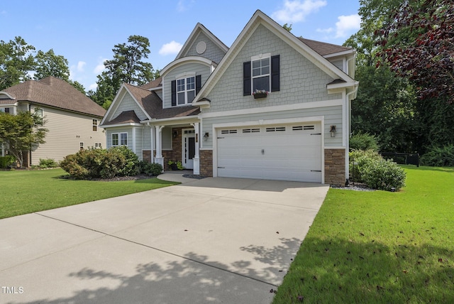 347 Country Mill Way, Fuquay Varina, NC 27526 - craftsman-style home featuring stone siding, concrete driveway, a front yard, an attached garage, and roof with shingles