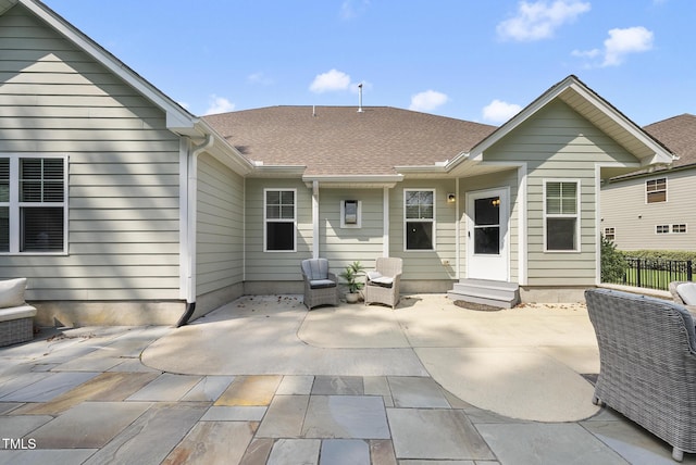 347 Country Mill Way, Fuquay Varina, NC 27526 - back of house with entry steps, a patio, and roof with shingles